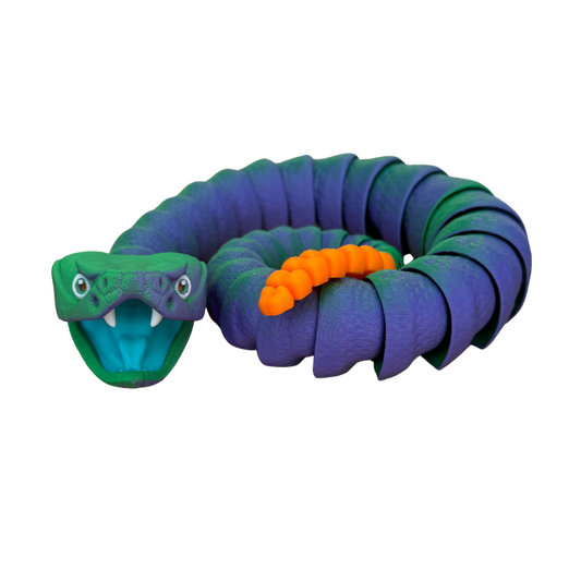 Blue Green Rattle Snake toy with segmented purple-blue body, green head, and orange tail rattles, resembling a coiled serpent.
